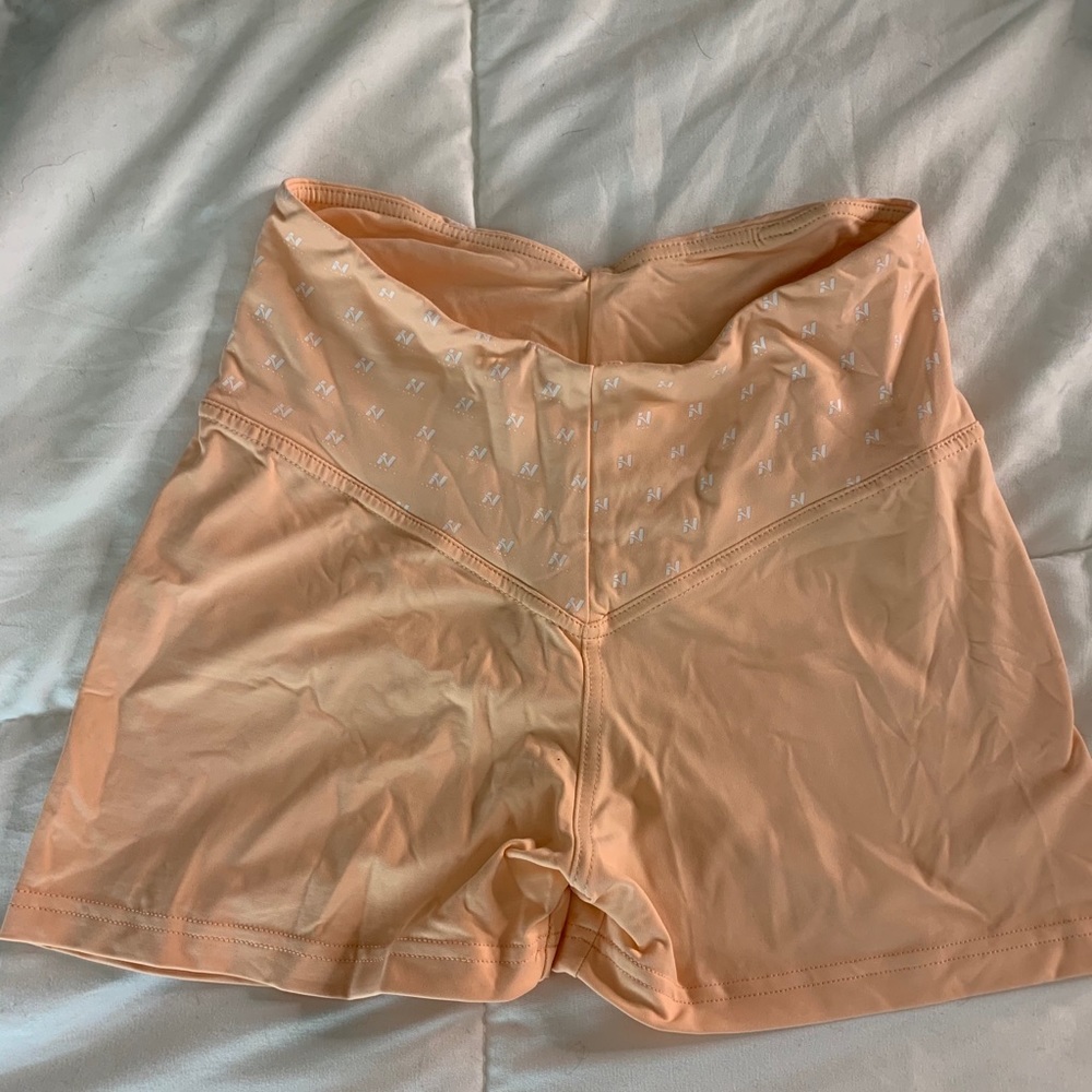 Orange nebbia fitness butt scrunch shorts